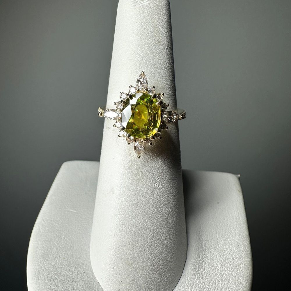 NWT 8.2x7.2mm Oval Cut Sphene with .64ctw diamonds in 14kt yellow gold ring!